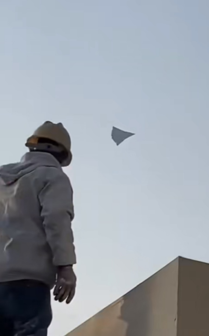 China‘s sixth-generation fighter fly over a worker